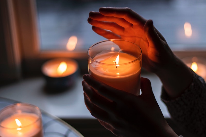 person holding candle